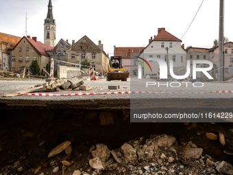 Washed out edge of a road is seen as massive flooding affected tourist resorts in southern Poland - Ladek Zdroj, Poland on September 27, 202...