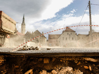 Washed out edge of a road is seen as massive flooding affected tourist resorts in southern Poland - Ladek Zdroj, Poland on September 27, 202...