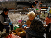 Volunteers prepare food for aid workers and affected citizens as massive flooding affected tourist resorts in southern Poland - Klodzko, Pol...