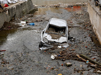 Debris and destroyed car are seen  as massive flooding affected tourist resorts in southern Poland - Klodzko, Poland on September 27, 2024....