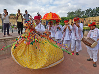 Rajasthani folk artists perform during the World Tourism Day celebration at the historical Jantar Mantar in Jaipur, Rajasthan, India, on Sep...