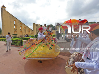 Rajasthani folk artists perform during the World Tourism Day celebration at the historical Jantar Mantar in Jaipur, Rajasthan, India, on Sep...