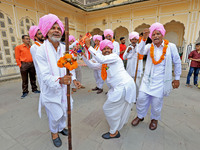 Rajasthani folk artists perform during the World Tourism Day celebration at the historical Hawa Mahal in Jaipur, Rajasthan, India, on Septem...