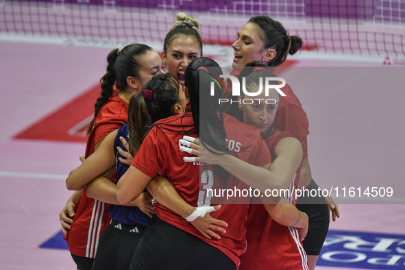 Olympiacos Athens celebrates scoring during the team's International Trophy ''Una squadra per un sorriso'' match between Reale Mutua Fenera...