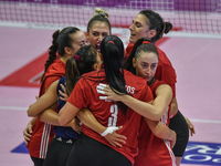 Olympiacos Athens celebrates scoring during the team's International Trophy ''Una squadra per un sorriso'' match between Reale Mutua Fenera...