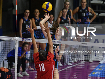 Lucille Giquel of Chieri '76 is in action during the International Trophy ''Una squadra per un sorriso'' match between Reale Mutua Fenera Ch...