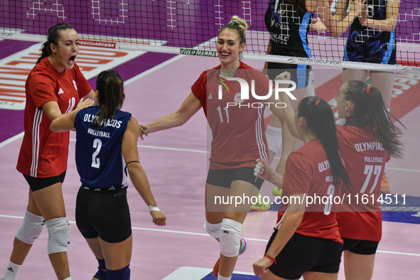 Olympiacos Athens celebrates scoring during the team's International Trophy ''Una squadra per un sorriso'' match between Reale Mutua Fenera...