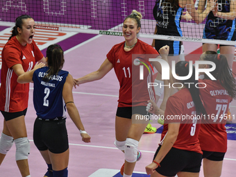 Olympiacos Athens celebrates scoring during the team's International Trophy ''Una squadra per un sorriso'' match between Reale Mutua Fenera...