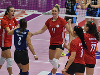 Olympiacos Athens celebrates scoring during the team's International Trophy ''Una squadra per un sorriso'' match between Reale Mutua Fenera...