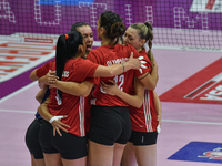 Olympiacos Athens celebrates scoring during the team's International Trophy ''Una squadra per un sorriso'' match between Reale Mutua Fenera...