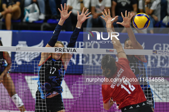 Milica Kubura of Olympiacos Athens is in action during the International Trophy ''Una squadra per un sorriso'' match between Reale Mutua Fen...