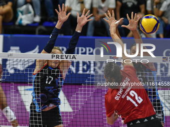 Milica Kubura of Olympiacos Athens is in action during the International Trophy ''Una squadra per un sorriso'' match between Reale Mutua Fen...