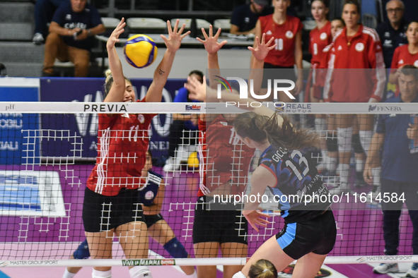 Lucille Giquel of Chieri '76 is in action during the International Trophy ''Una squadra per un sorriso'' match between Reale Mutua Fenera Ch...