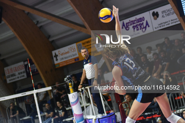 Lucille Giquel of Chieri '76 is in action during the International Trophy ''Una squadra per un sorriso'' match between Reale Mutua Fenera Ch...