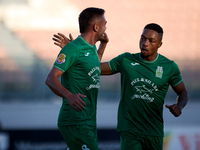 Jake Grech (L) of Floriana celebrates scoring the 1-0 goal with teammate Kemar Reid (R) during the Malta 360 Sports Premier League soccer ma...