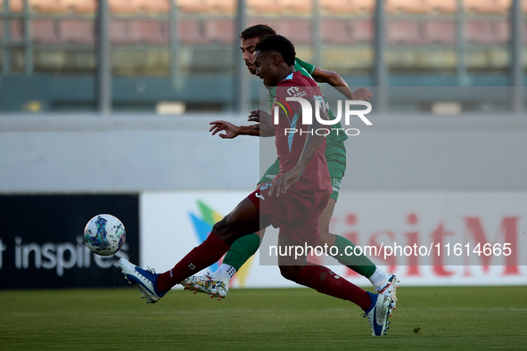 Jake Grech of Floriana shoots at goal and scores the 1-0 goal for his team during the Malta 360 Sports Premier League soccer match between F...