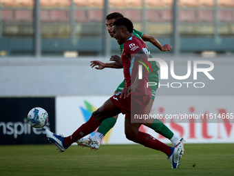 Jake Grech of Floriana shoots at goal and scores the 1-0 goal for his team during the Malta 360 Sports Premier League soccer match between F...