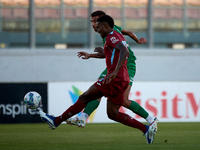 Jake Grech of Floriana shoots at goal and scores the 1-0 goal for his team during the Malta 360 Sports Premier League soccer match between F...