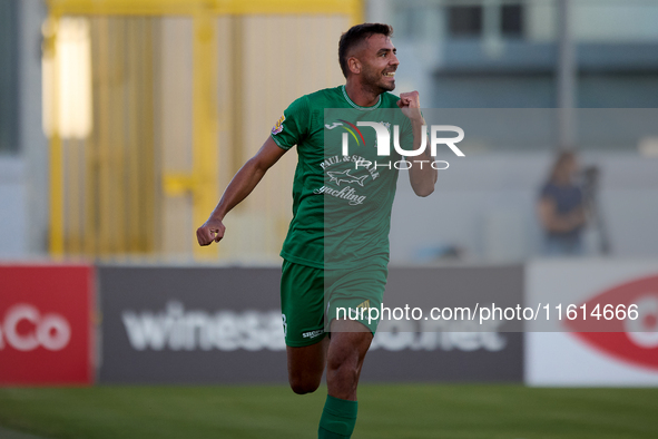 Jake Grech of Floriana gestures in celebration after scoring the 1-0 goal during the Malta 360 Sports Premier League soccer match between Fl...