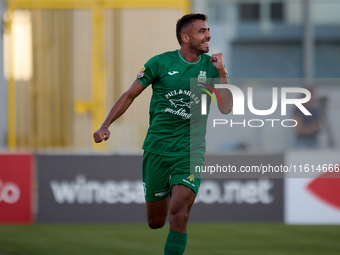 Jake Grech of Floriana gestures in celebration after scoring the 1-0 goal during the Malta 360 Sports Premier League soccer match between Fl...