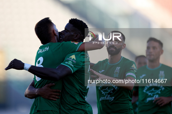 Jake Grech (L) of Floriana celebrates scoring the 1-0 goal with his teammates during the Malta 360 Sports Premier League soccer match betwee...