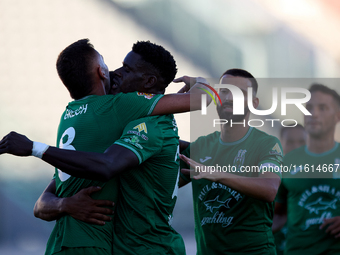 Jake Grech (L) of Floriana celebrates scoring the 1-0 goal with his teammates during the Malta 360 Sports Premier League soccer match betwee...