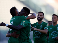 Jake Grech (L) of Floriana celebrates scoring the 1-0 goal with his teammates during the Malta 360 Sports Premier League soccer match betwee...