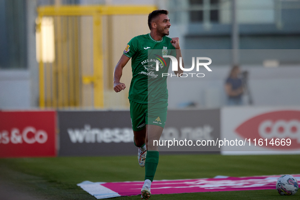 Jake Grech of Floriana gestures in celebration after scoring the 1-0 goal during the Malta 360 Sports Premier League soccer match between Fl...