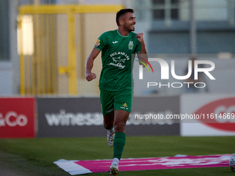 Jake Grech of Floriana gestures in celebration after scoring the 1-0 goal during the Malta 360 Sports Premier League soccer match between Fl...