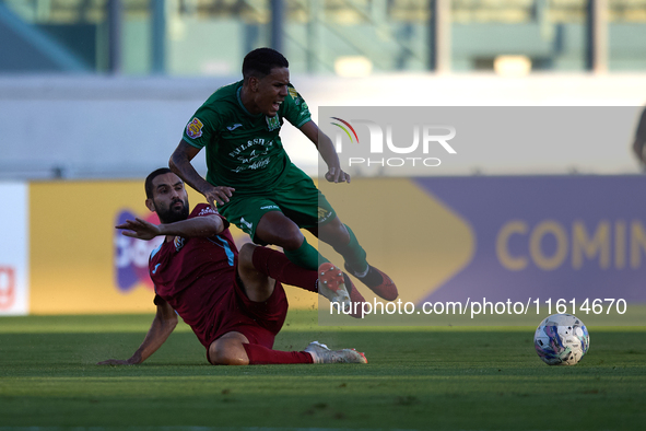 Thiago Dos Santos Nascimento (R) of Floriana is challenged by Jurgen Pisani (L) of Gzira United during the Malta 360 Sports Premier League s...