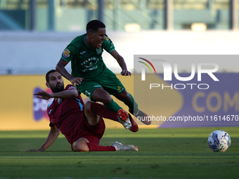 Thiago Dos Santos Nascimento (R) of Floriana is challenged by Jurgen Pisani (L) of Gzira United during the Malta 360 Sports Premier League s...