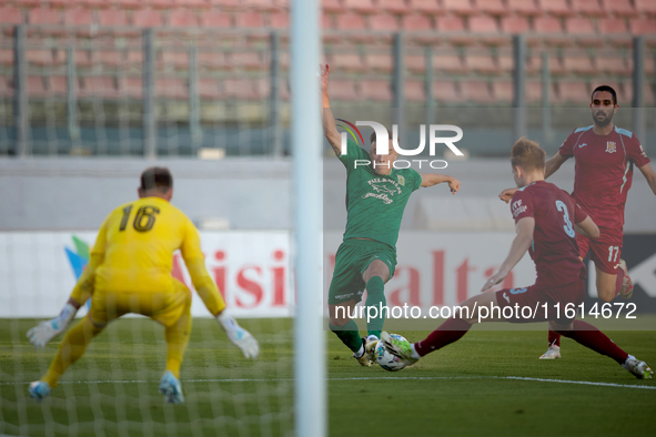 Carlo Zammit Lonardelli (C) of Floriana is in action during the Malta 360 Sports Premier League soccer match between Floriana and Gzira Unit...