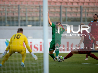 Carlo Zammit Lonardelli (C) of Floriana is in action during the Malta 360 Sports Premier League soccer match between Floriana and Gzira Unit...