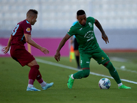 Kemar Reid (R) of Floriana is closely followed by Thiago Espindola de Paula (L) of Gzira United during the Malta 360 Sports Premier League s...