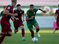 Jake Grech (R) of Floriana is in action during the Malta 360 Sports Premier League soccer match between Floriana and Gzira United at the Nat...