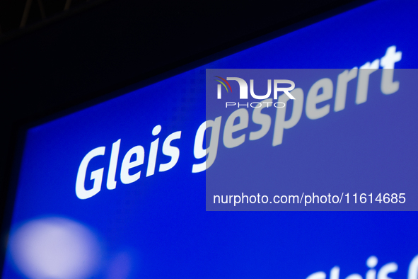 A general view of a sign indicating the closure of a platform due to construction work is seen at Cologne Central Station, which is closed t...