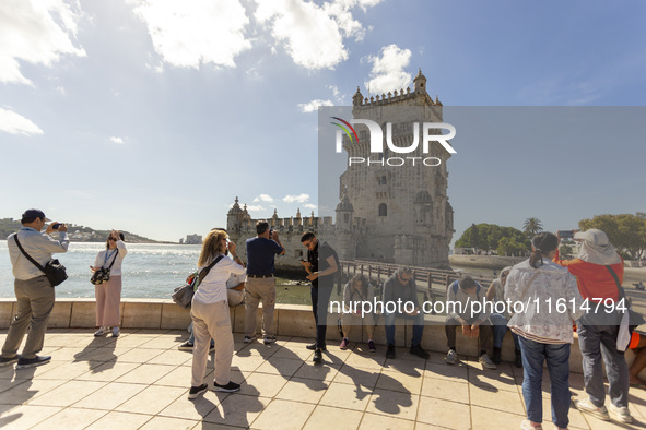 A general view of people at the Belem Tower in Lisbon, Portugal, on September 27, 2024. Data from the BdP indicate that revenue from tourism...