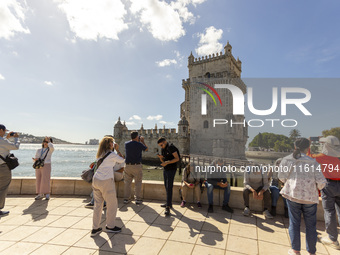 A general view of people at the Belem Tower in Lisbon, Portugal, on September 27, 2024. Data from the BdP indicate that revenue from tourism...