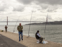 A general view of people fishing at the Tejo River in Lisbon, Portugal, on September 27, 2024. Data from the BdP indicate that revenue from...