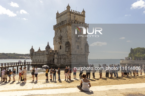 A general view of people at the Belem Tower in Lisbon, Portugal, on September 27, 2024. Data from the BdP indicate that revenue from tourism...