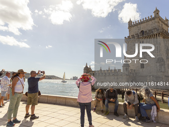 A general view of people at the Belem Tower in Lisbon, Portugal, on September 27, 2024. Data from the BdP indicate that revenue from tourism...