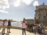 A general view of people at the Belem Tower in Lisbon, Portugal, on September 27, 2024. Data from the BdP indicate that revenue from tourism...