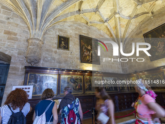 People are seen inside the Monasterio dos Jeronimos Church in Lisbon, Portugal, on September 27, 2024. Data from the BdP indicate that reven...