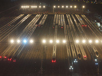 Bullet trains stop at the Nanjing South Railway station in Nanjing, China, on September 28, 2024. China's railways are expected to carry 175...