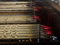 Bullet trains stop at the Nanjing South Railway station in Nanjing, China, on September 28, 2024. China's railways are expected to carry 175...