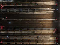 Bullet trains stop at the Nanjing South Railway station in Nanjing, China, on September 28, 2024. China's railways are expected to carry 175...