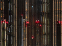 Bullet trains stop at the Nanjing South Railway station in Nanjing, China, on September 28, 2024. China's railways are expected to carry 175...