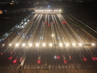 Bullet trains stop at the Nanjing South Railway station in Nanjing, China, on September 28, 2024. China's railways are expected to carry 175...