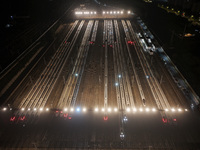 Bullet trains stop at the Nanjing South Railway station in Nanjing, China, on September 28, 2024. China's railways are expected to carry 175...