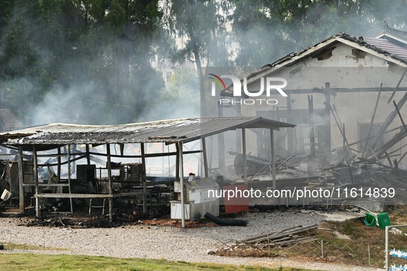 A hotel house is engulfed by fire in Xindian town, Tongren, China, on September 27, 2024. 